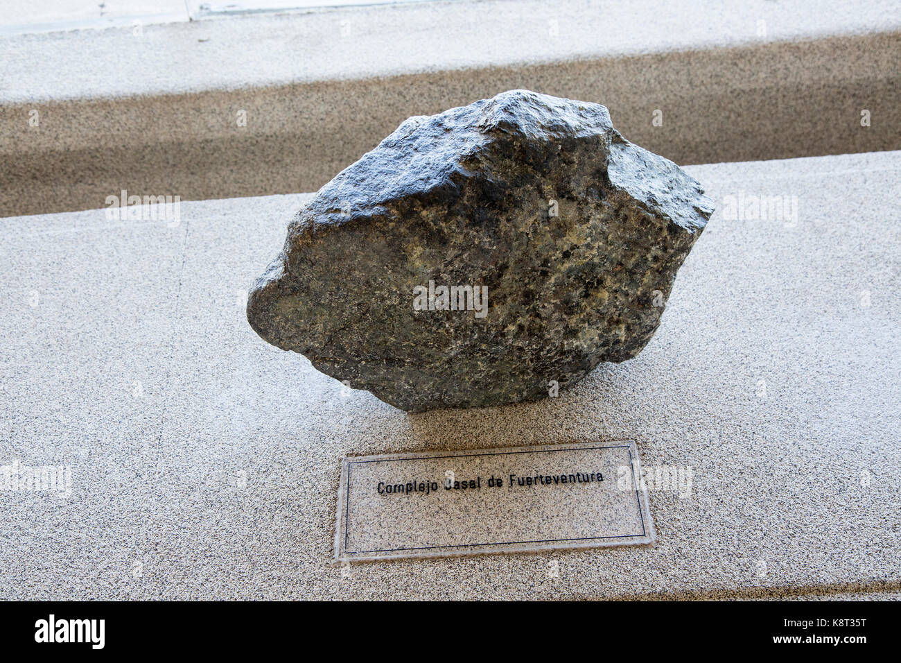 Basalt rock sample geology display, Casa de los Volcanes volcanic study centre, Lanzarote, Canary island, Spain Stock Photo