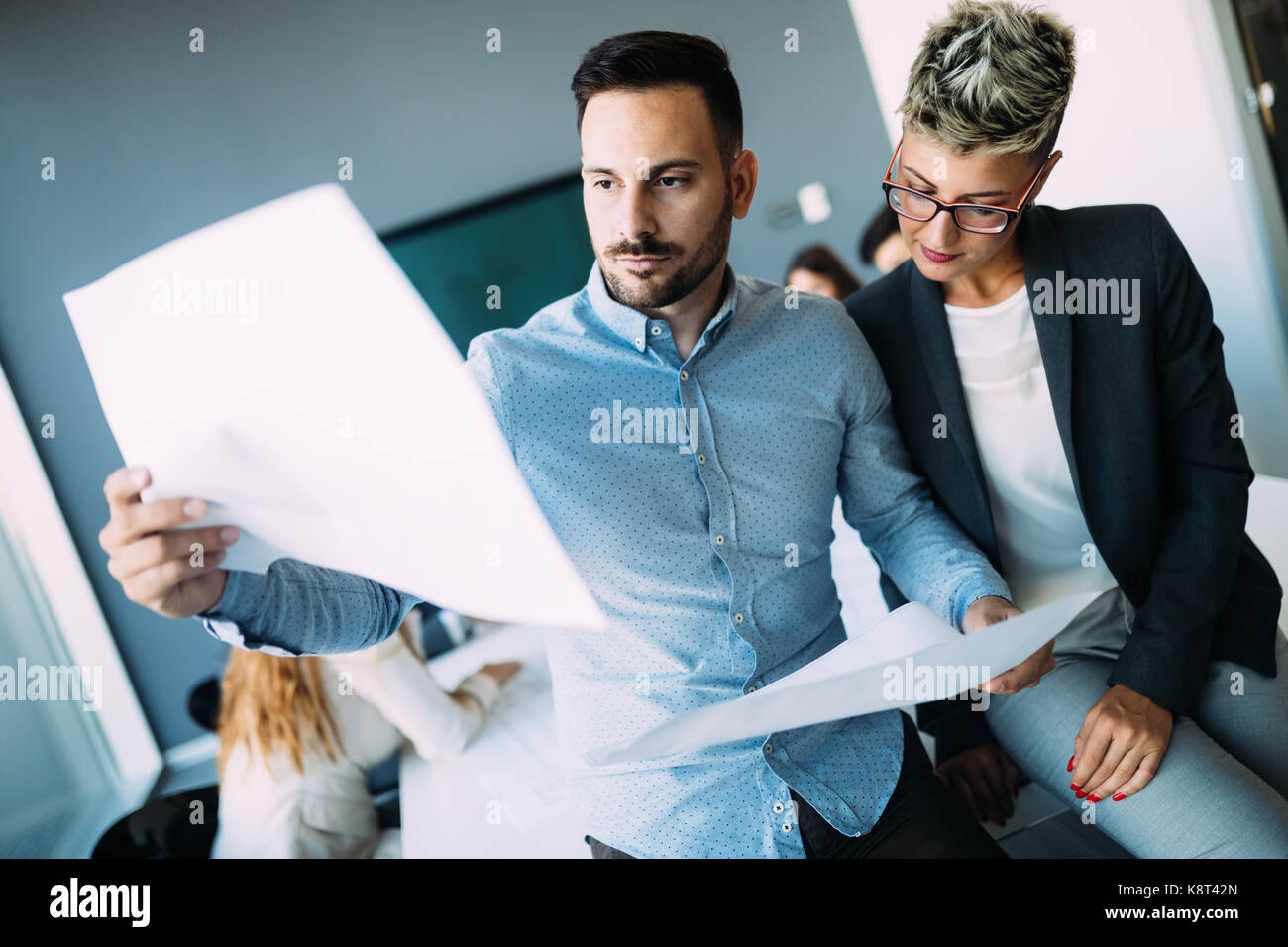 Portrait of architects having discussion in office Stock Photo