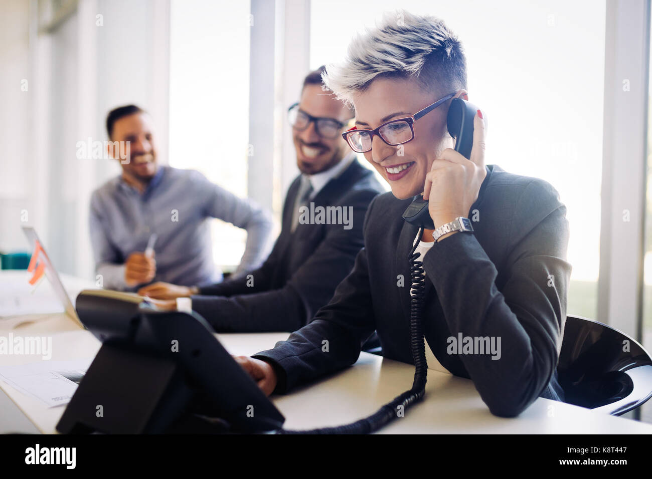 Portrait of busy female architect talking on phone Stock Photo