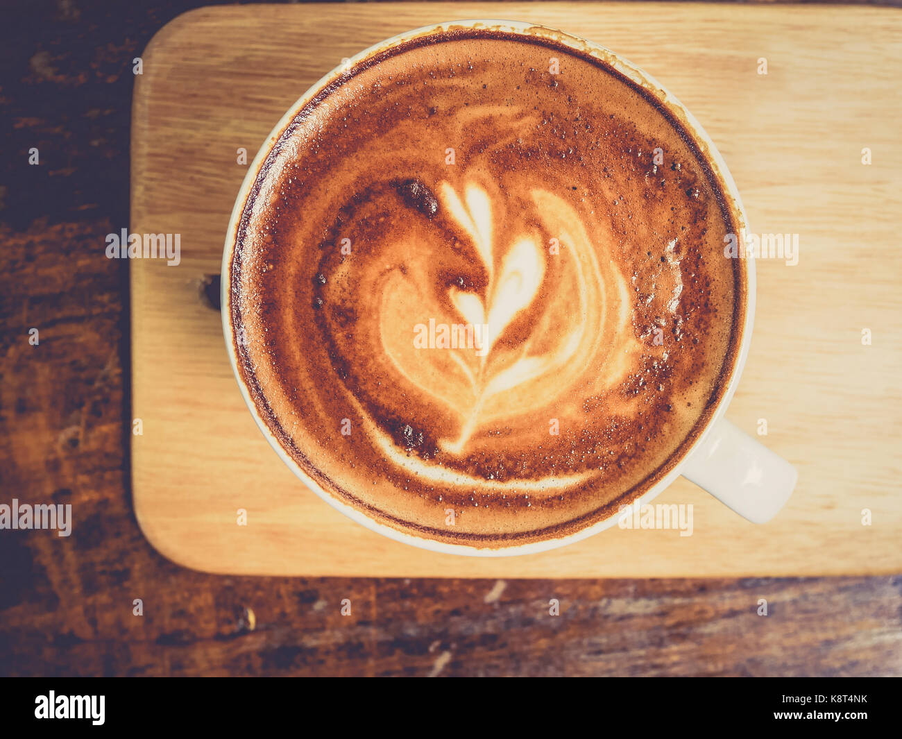 Latte art:Close up of hot Latte coffee in white mug Stock Photo