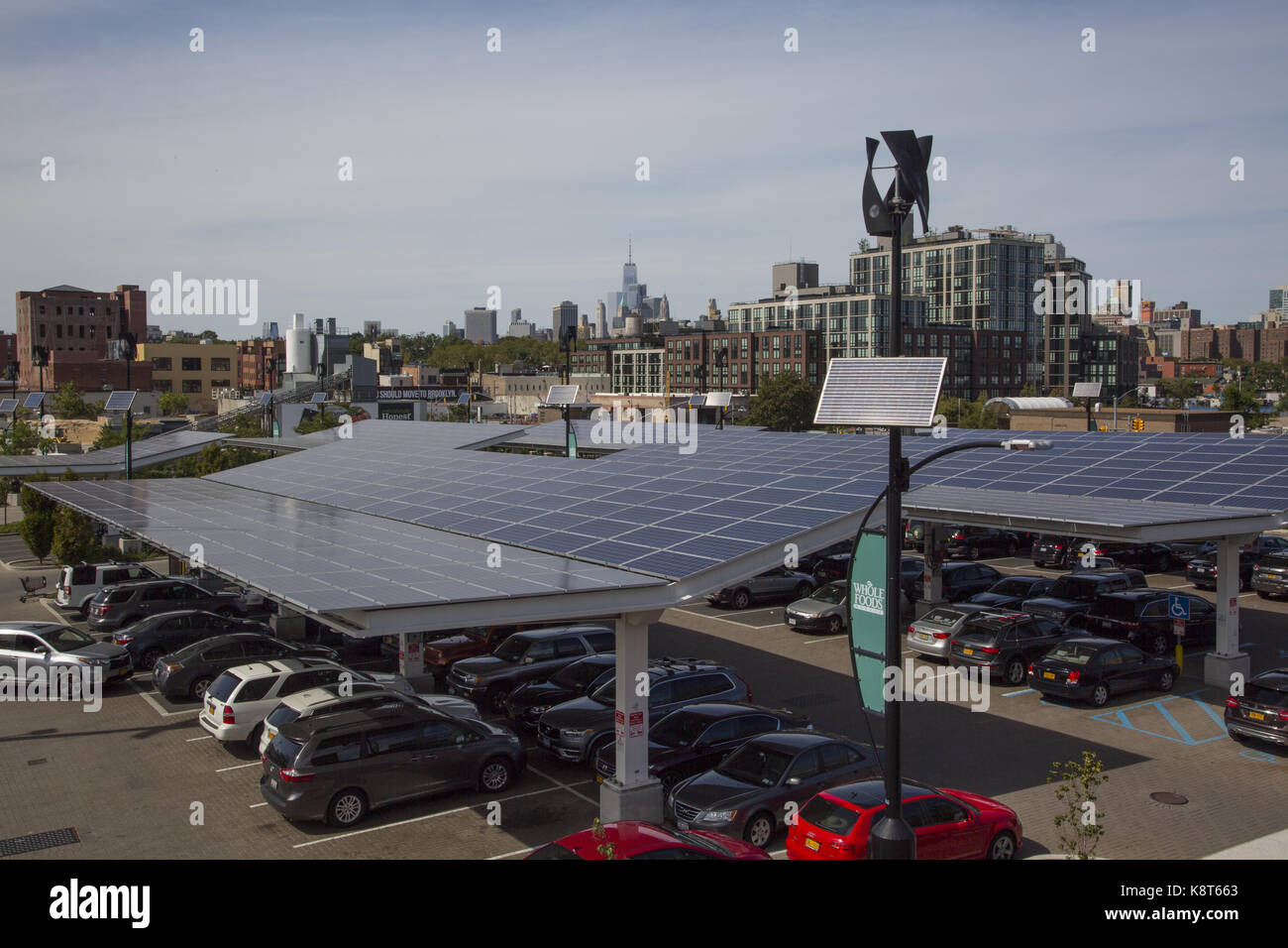 Solar panels on roofof parking lot at Whole Foods, Brooklyn, NY Stock