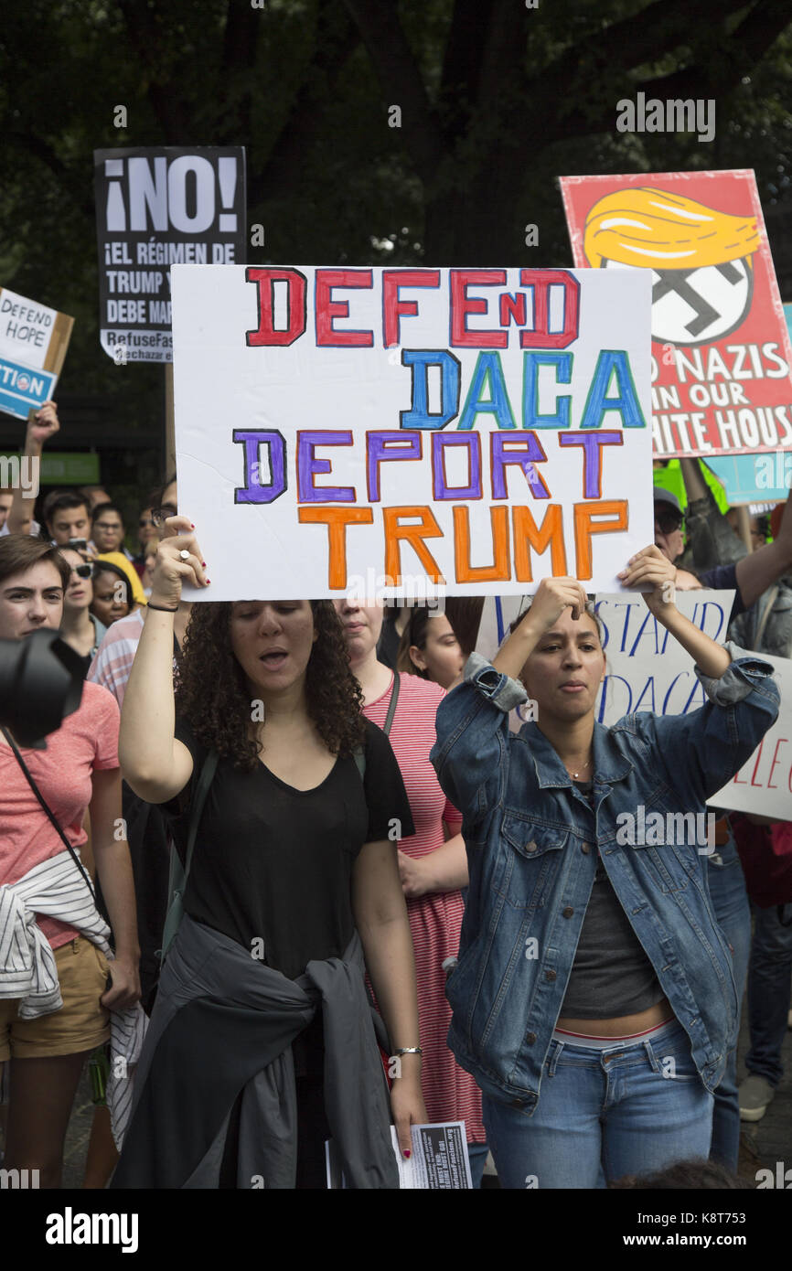 A large demonstration takes place against the Trump Administrtion's repeal of DACA (The Dreamers Act) at Columbus Circle by the Trump Hotel in New York City. Stock Photo