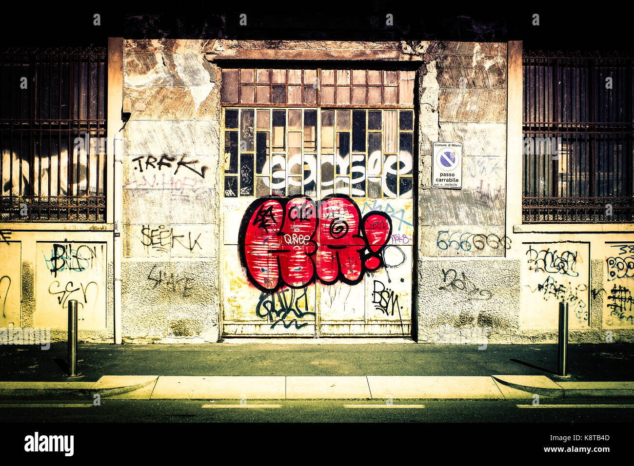 front view of a beautifully degraded building with graffiti tags and throw-up Stock Photo