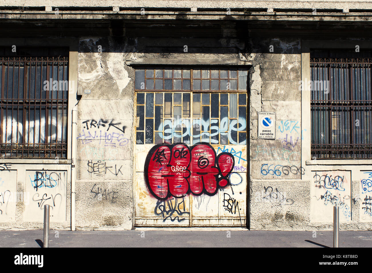 front view of a beautifully degraded building with graffiti tags and throw-up Stock Photo