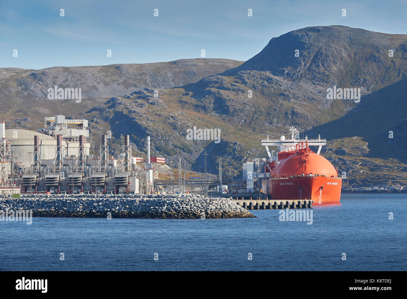 The Liquid Natural Gas Production Facility On Melkøya Island, Hammerfest, Norway With The LNG Carrier, Arctic Princess Moored Alongside. Stock Photo