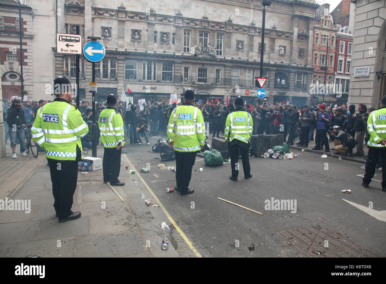 Metropolitan police and the public during an anti-austerity march. Stock Photo