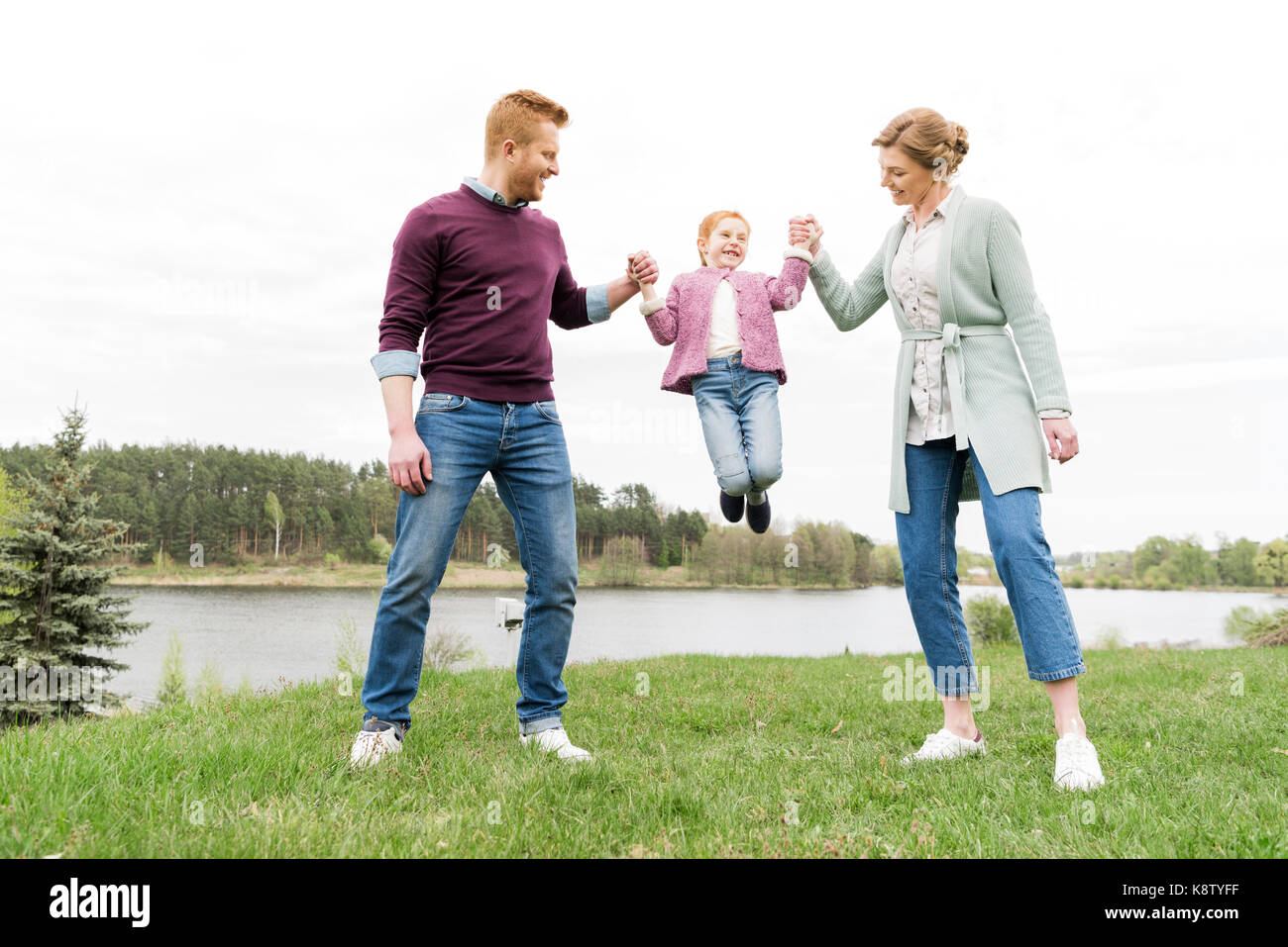 happy family holding hands Stock Photo Alamy