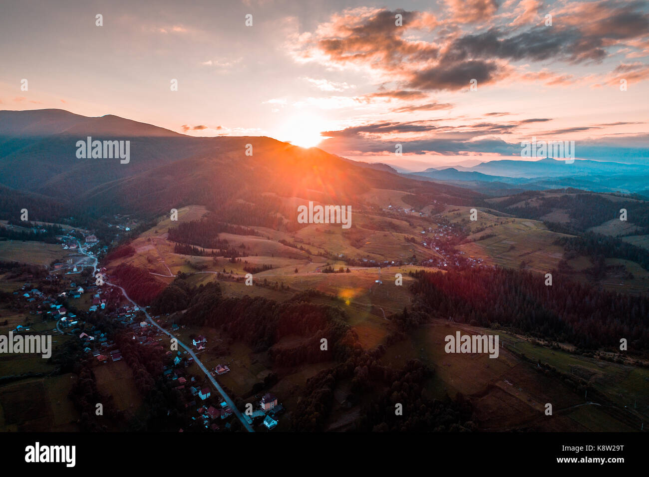 Aerial view of the village in the Carpathian mountains on the Sunset ...