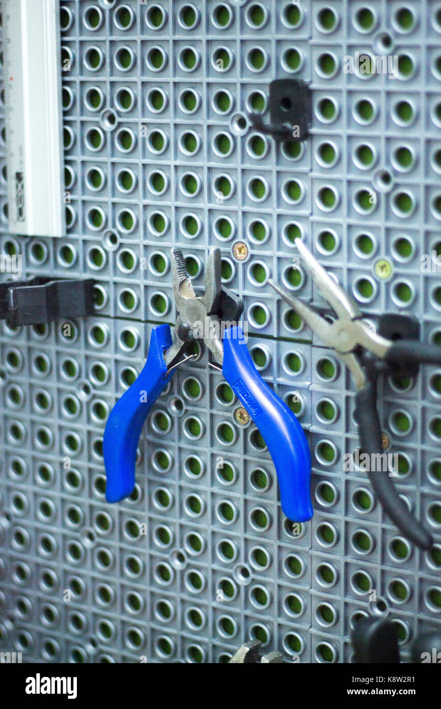 Inline roller skate shop mechanic tools in retail skates store to