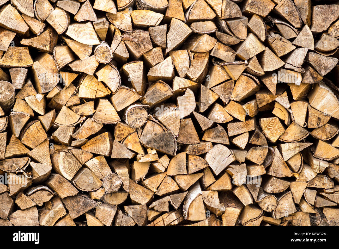 Firewood stacked for winter storage, and dried Stock Photo