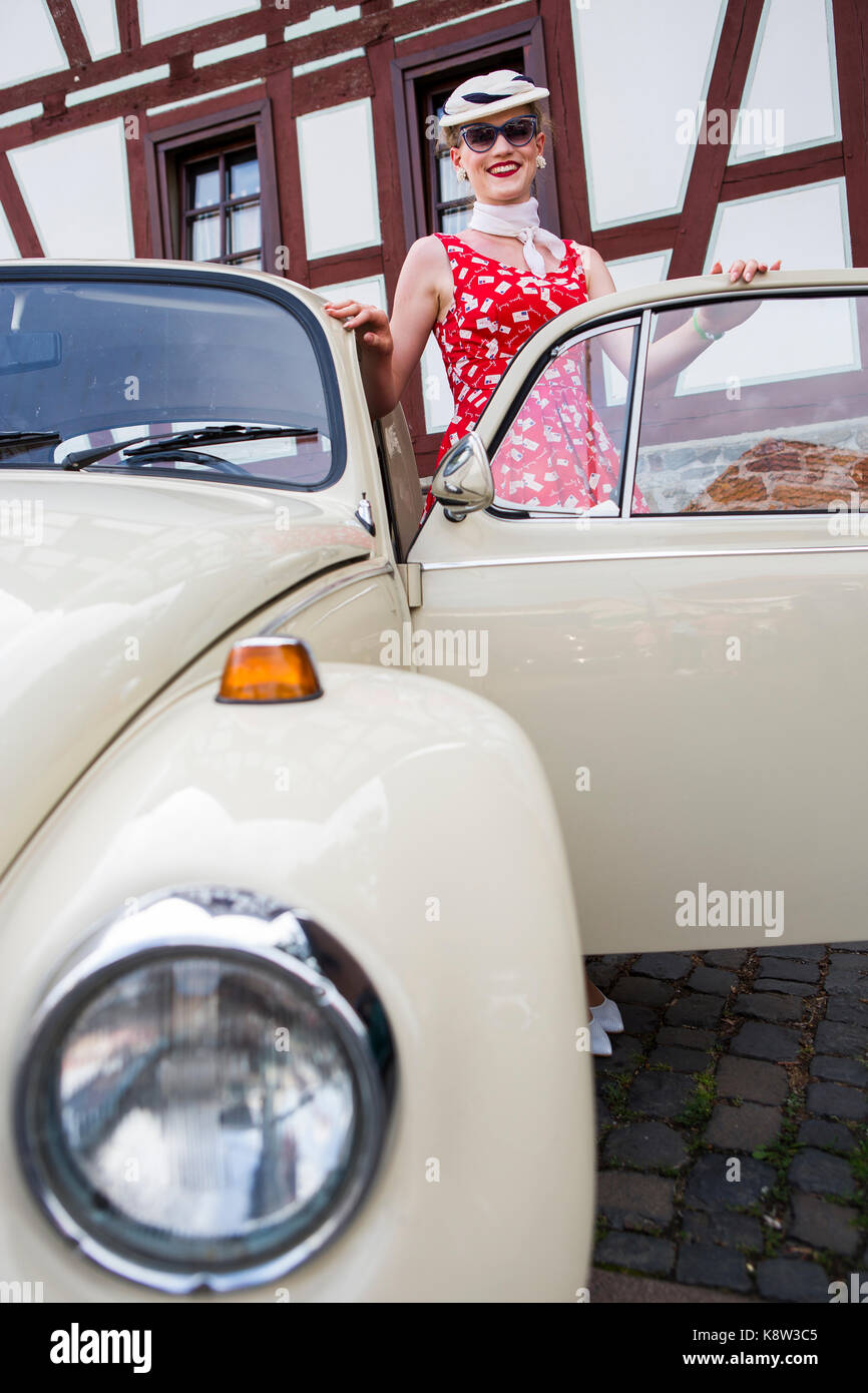 Elisabeth Weule from Stuttgart, Germany, is presenting her Volkswagen Beetle, Type 1, at classic car exhibition at Golden Oldies Festival 2017, Wettenberg, Germany. The Golden Oldies Festival is a annual nostalgic festival (est. in 1989) with focus on 1950s to1970s, with over 1000 exhibited classic cars and old-timers, over 50 live bands and nostalgic market. Credit: Christian Lademann Stock Photo