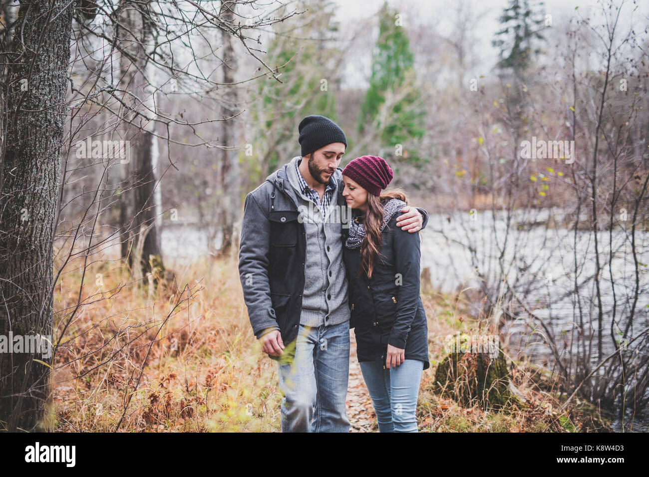 Couple in the autumn park Stock Photo - Alamy