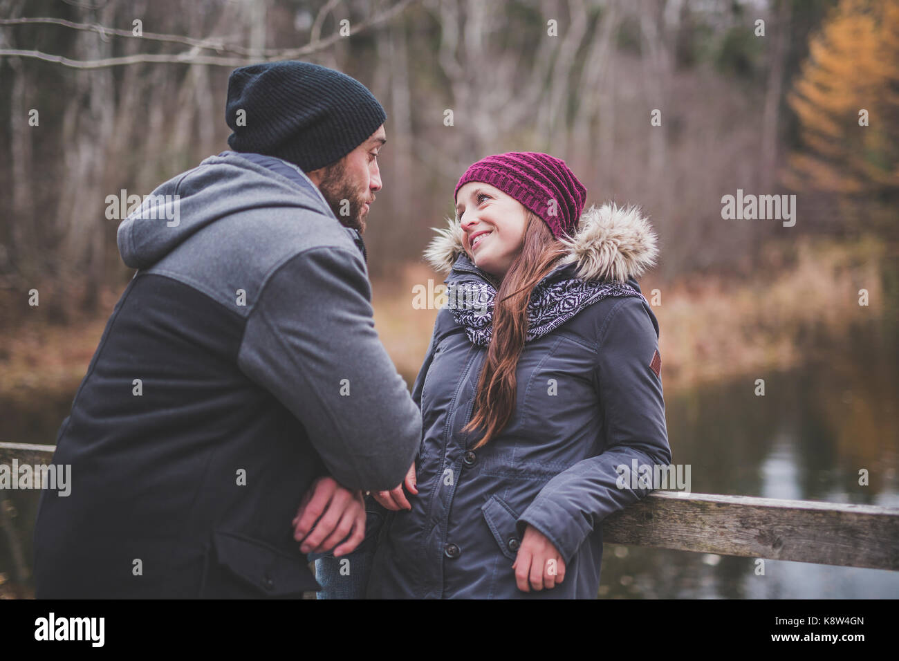 Couple in the autumn park Stock Photo - Alamy