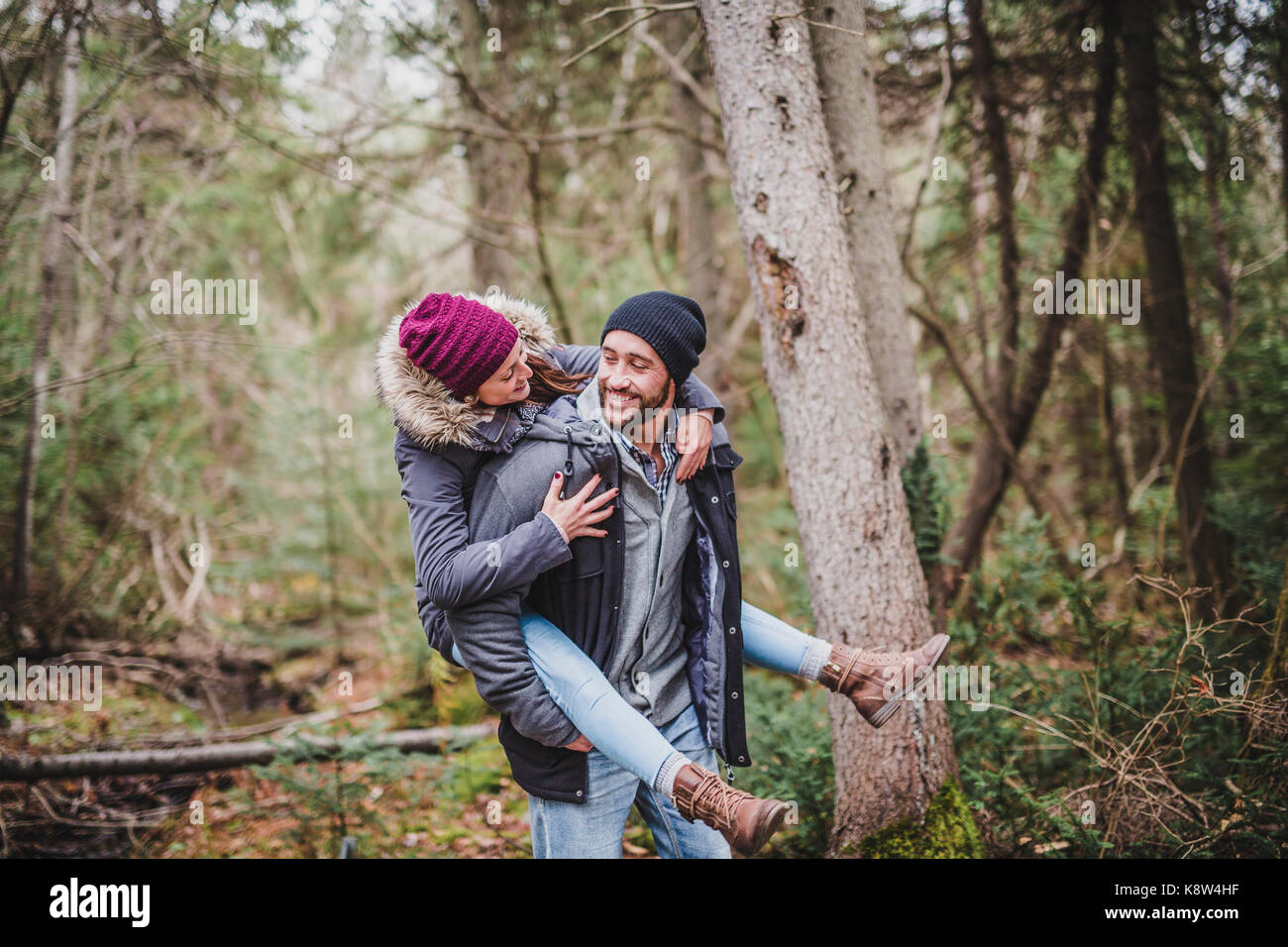 Couple in the autumn park Stock Photo - Alamy