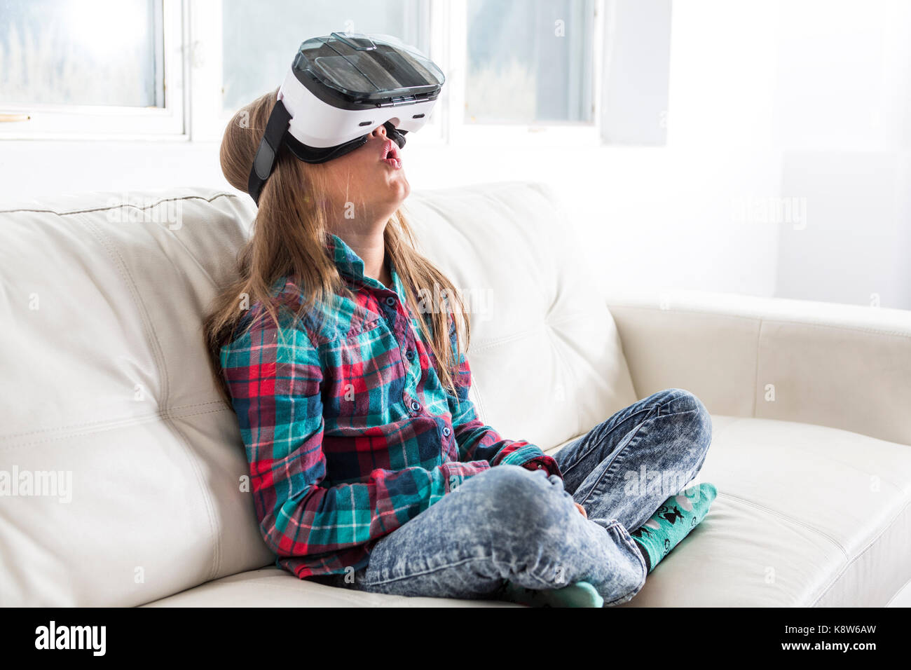 Girl wearing virtual reality goggles Stock Photo Alamy