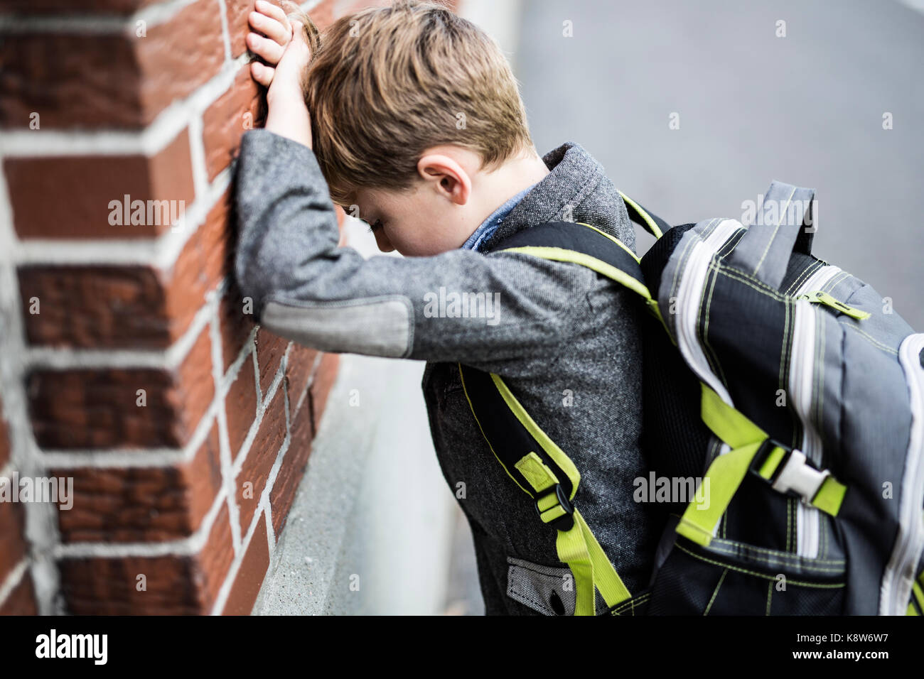 student boy outside at school standing Stock Photo