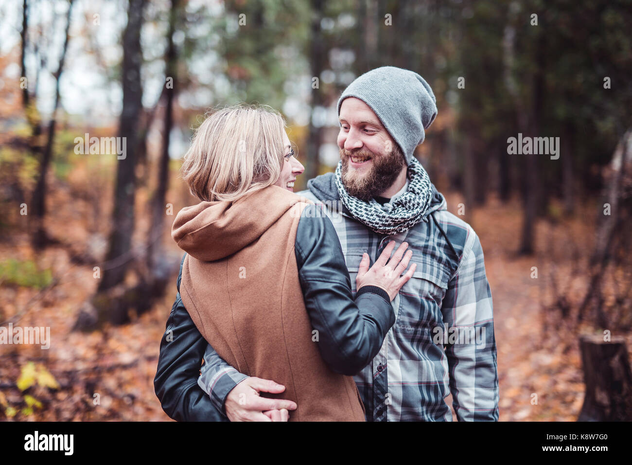 Couple in the autumn park Stock Photo - Alamy