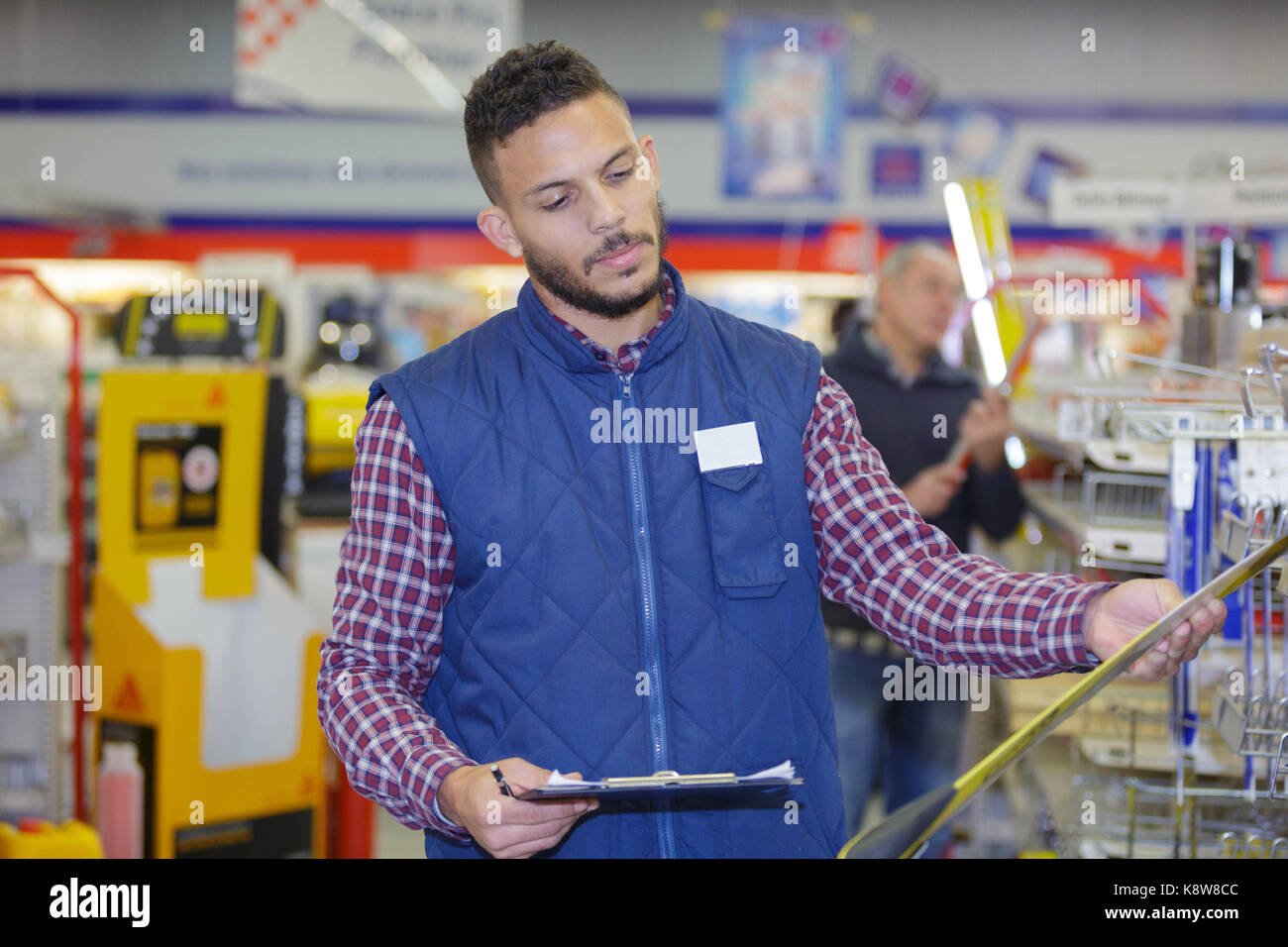 brand quality representative inspecting a product Stock Photo Alamy