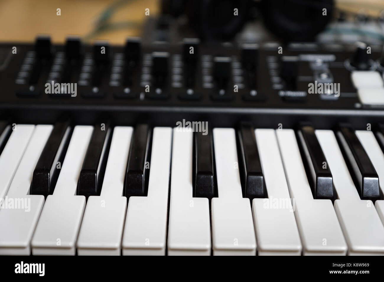 MIDI keyboard synthesizer piano keys closeup for electronic music production / recording Stock Photo