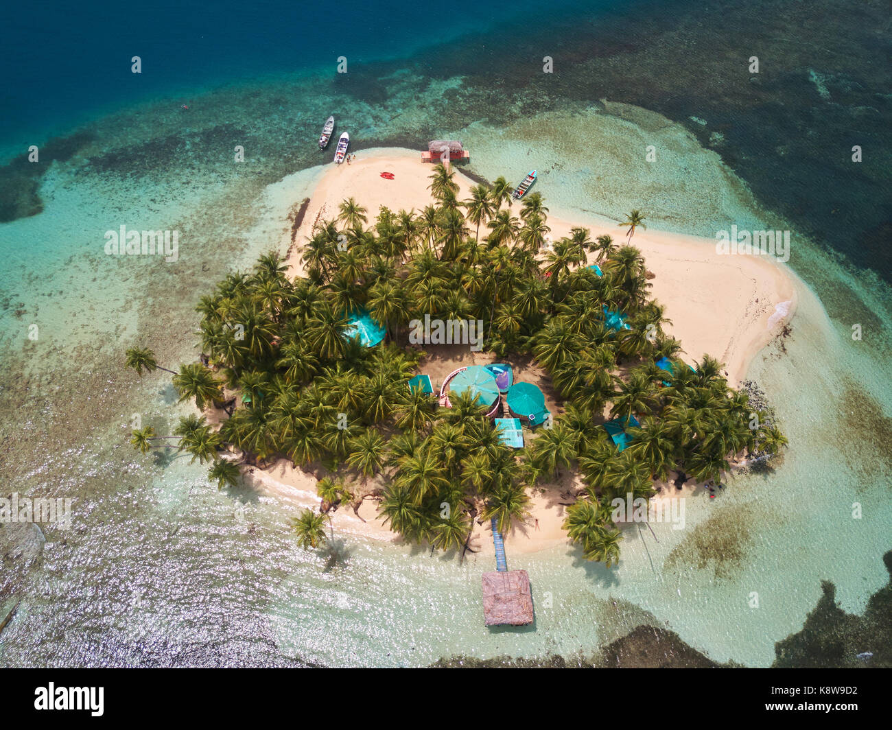 Villa on small tropical island aerial drone view Stock Photo - Alamy
