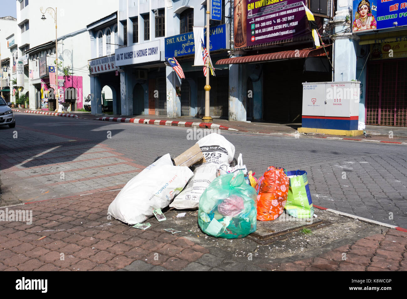 Ipoh, Malaysia - September 17, 2017: Rubbish at the roadside in Ipoh, capital city of Perak. Stock Photo