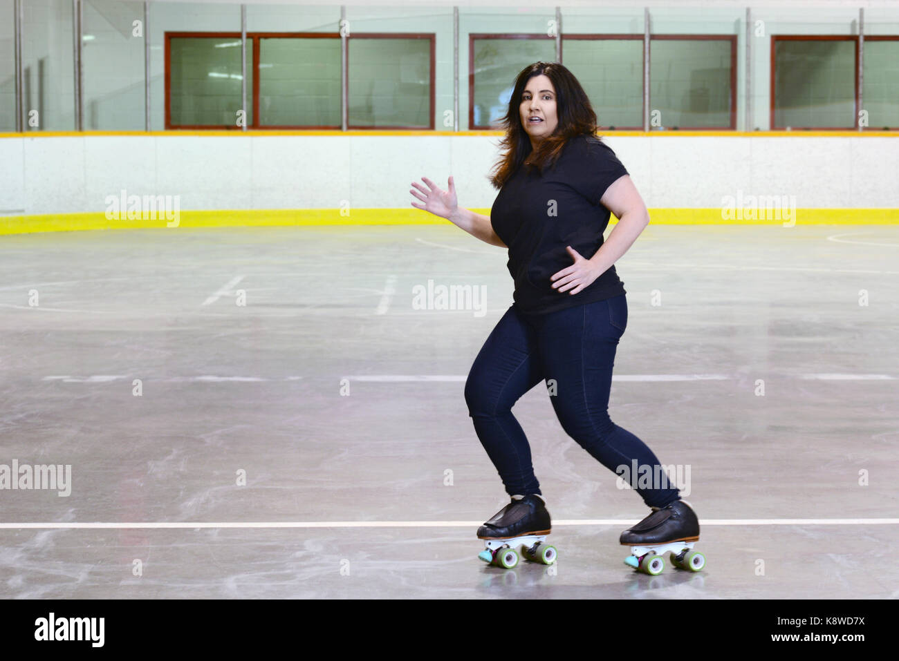 woman dancing on quad roller skates Stock Photo Alamy