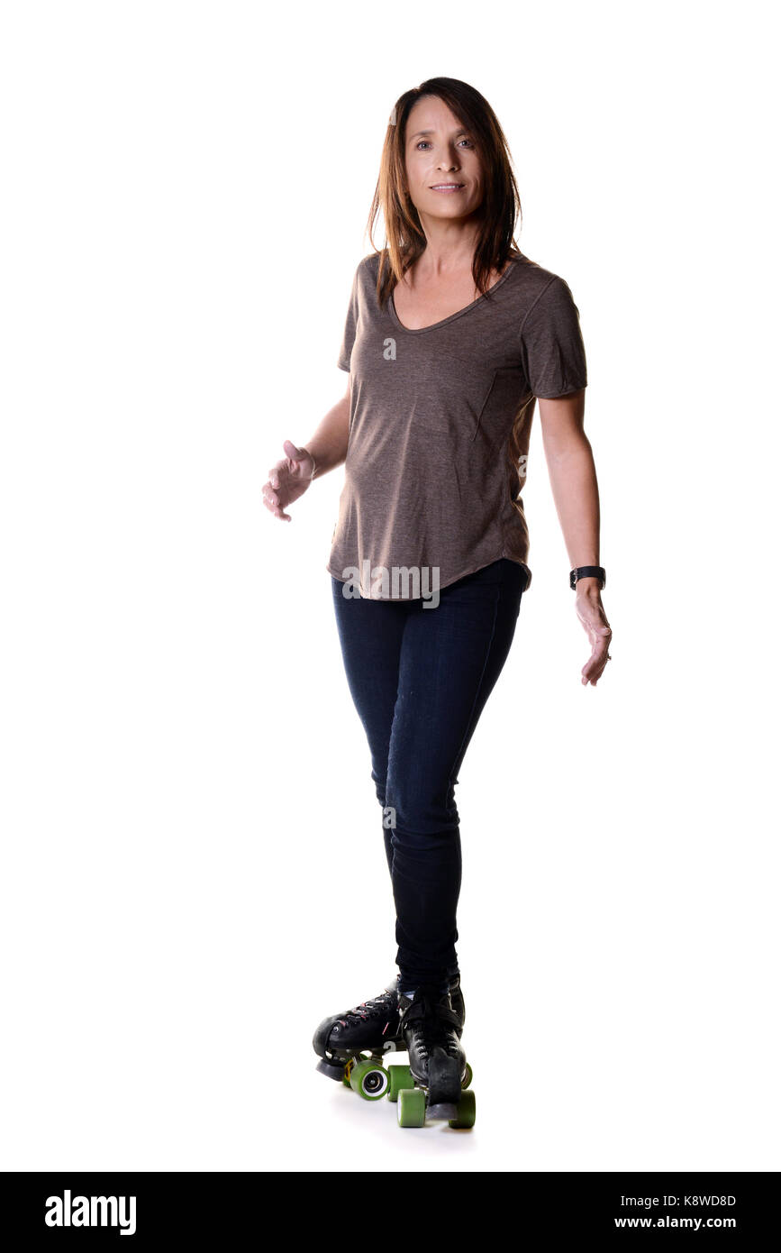 woman doing T stop on quad roller skates Stock Photo Alamy
