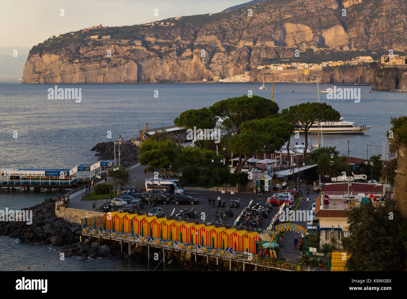 Sorrento, Italy, September 16 2017. The late afternoon sun casts a warm, golden glow over Marina Piccola in Sorrento, Italy. © Paul Davey Stock Photo