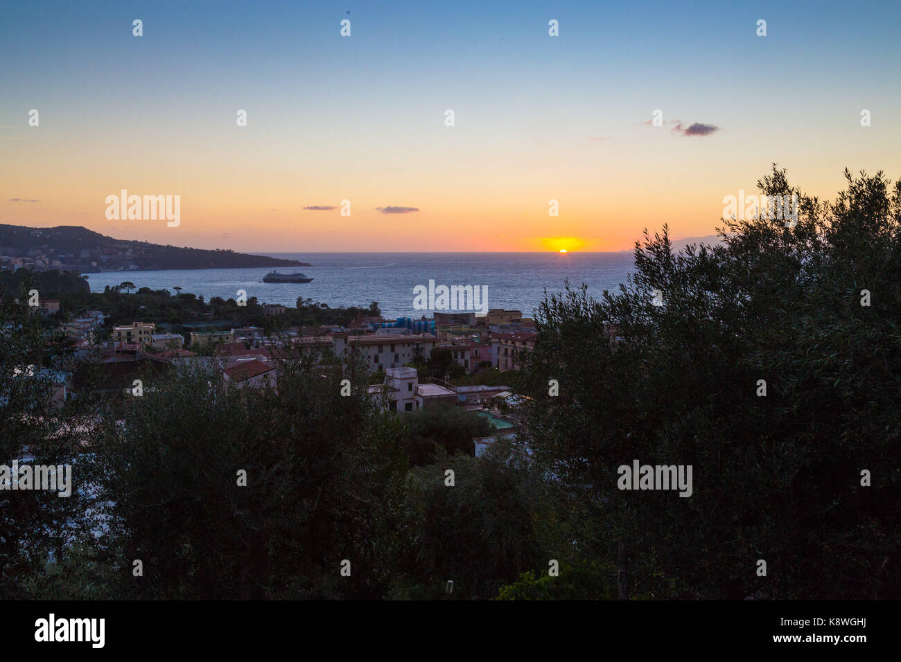 Sorrento, Italy, September 17 2017. The sun sets across the Bay of Naples, seen from the town of Meta near Sorrento, southern Italy. © Paul Davey Stock Photo