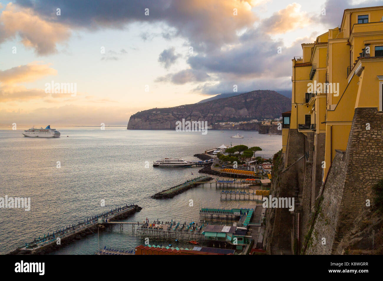 Sorrento, Italy, September 15 2017. As day breaks, a cruise ship lies at anchor off Sorrento, Italy. © Paul Davey Stock Photo