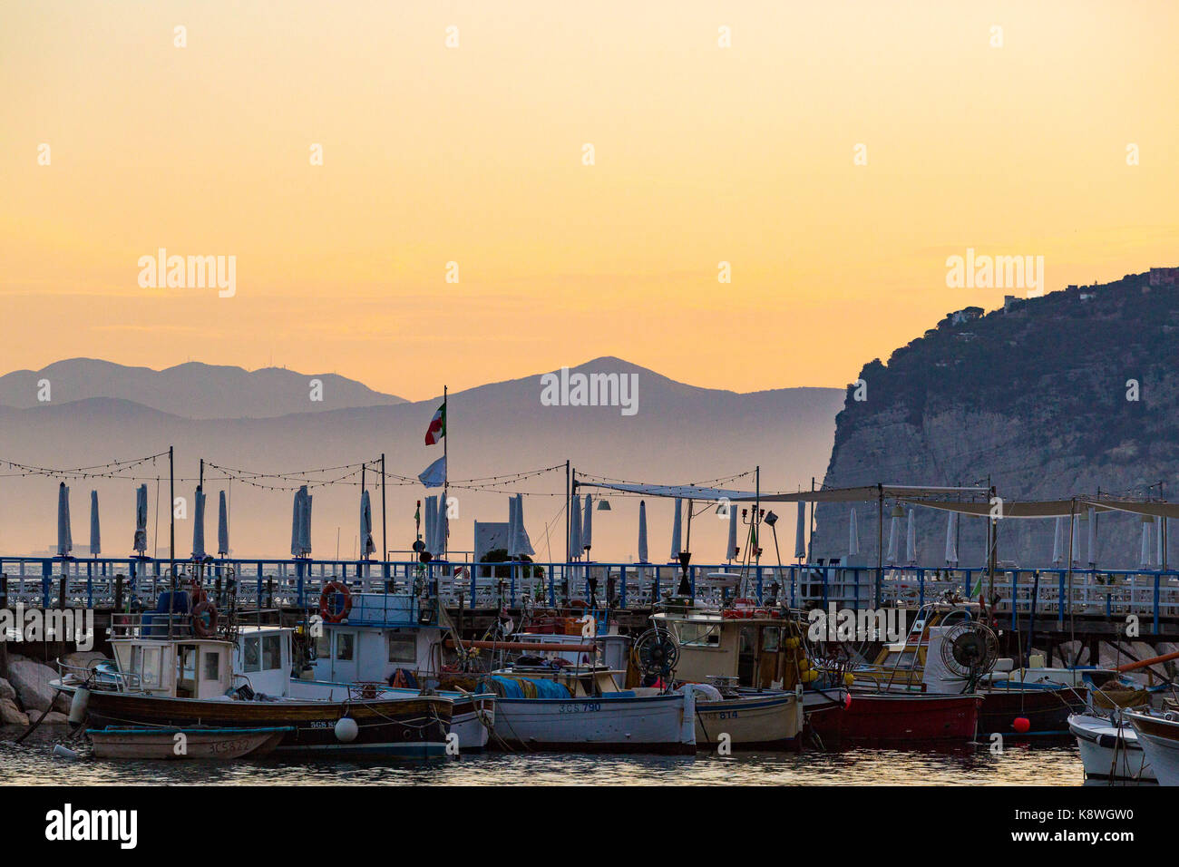 Sorrento, Italy, September 16 2017. Fishing boats rest on their moorings at dawn in Marina Grande, Sorrento, Italy. © Paul Davey Stock Photo