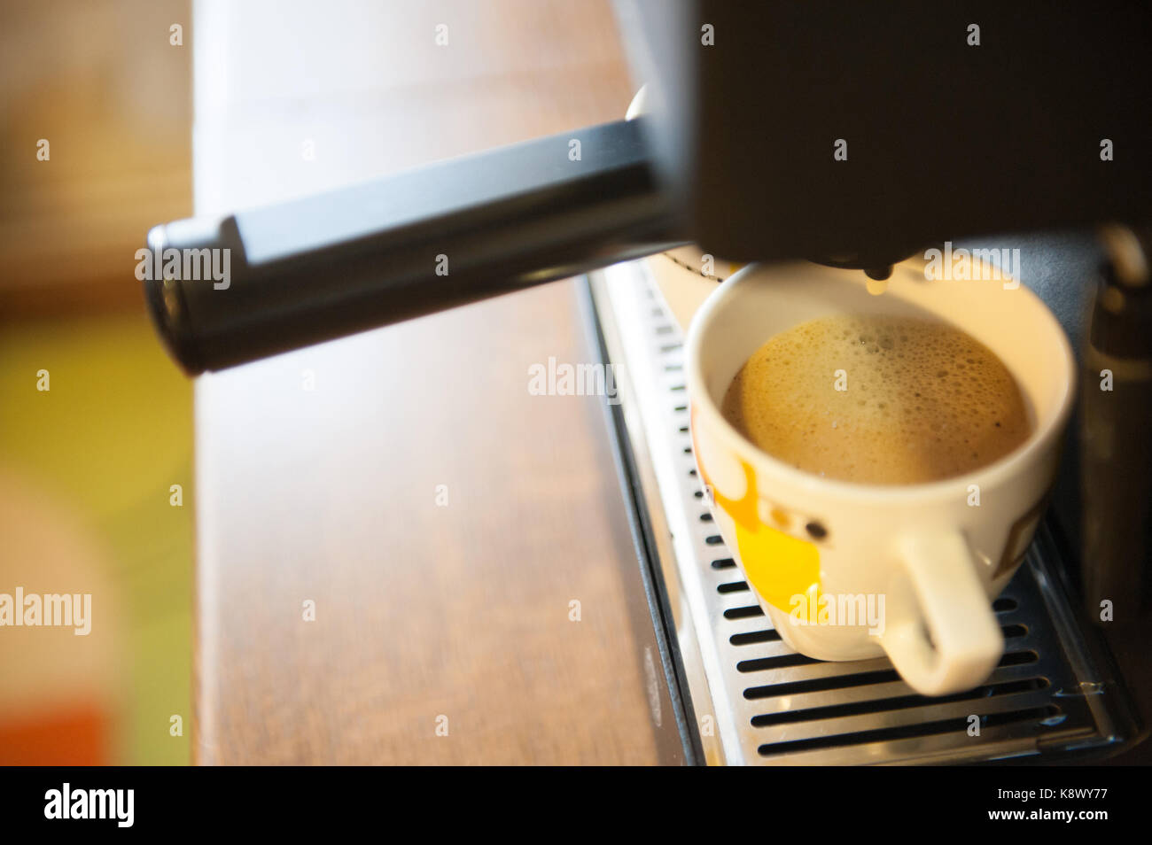 Coffee making using espresso machine at home Stock Photo Alamy