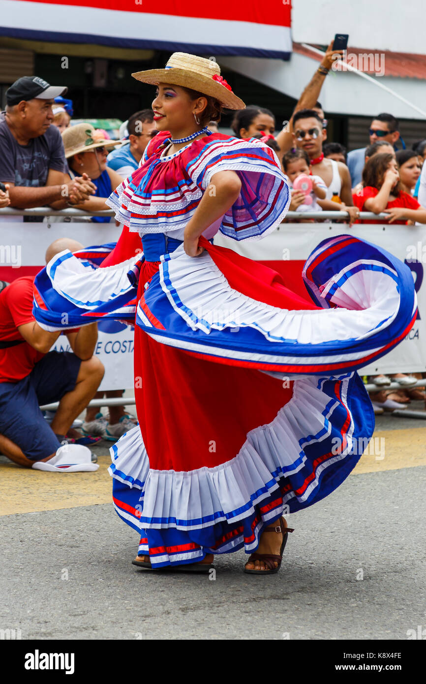 Dancers in colorful traditional costumes wow onlookers with their  traditional dances during the Independence Day parade in Quepos, Costa Rica  Stock Photo - Alamy