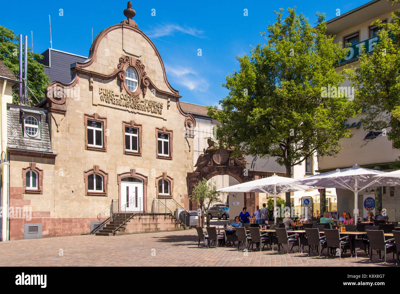 Local people lunching at a cafe in Trier, Germany Stock Photo