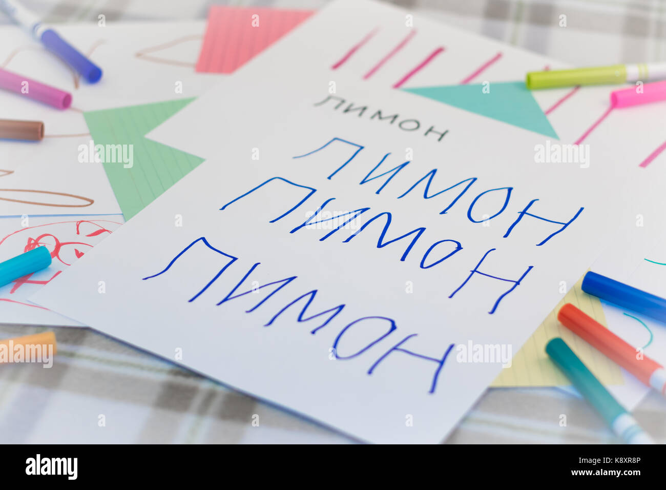 Russian; Kids Writing Name of the Fruits for Practice (Translation