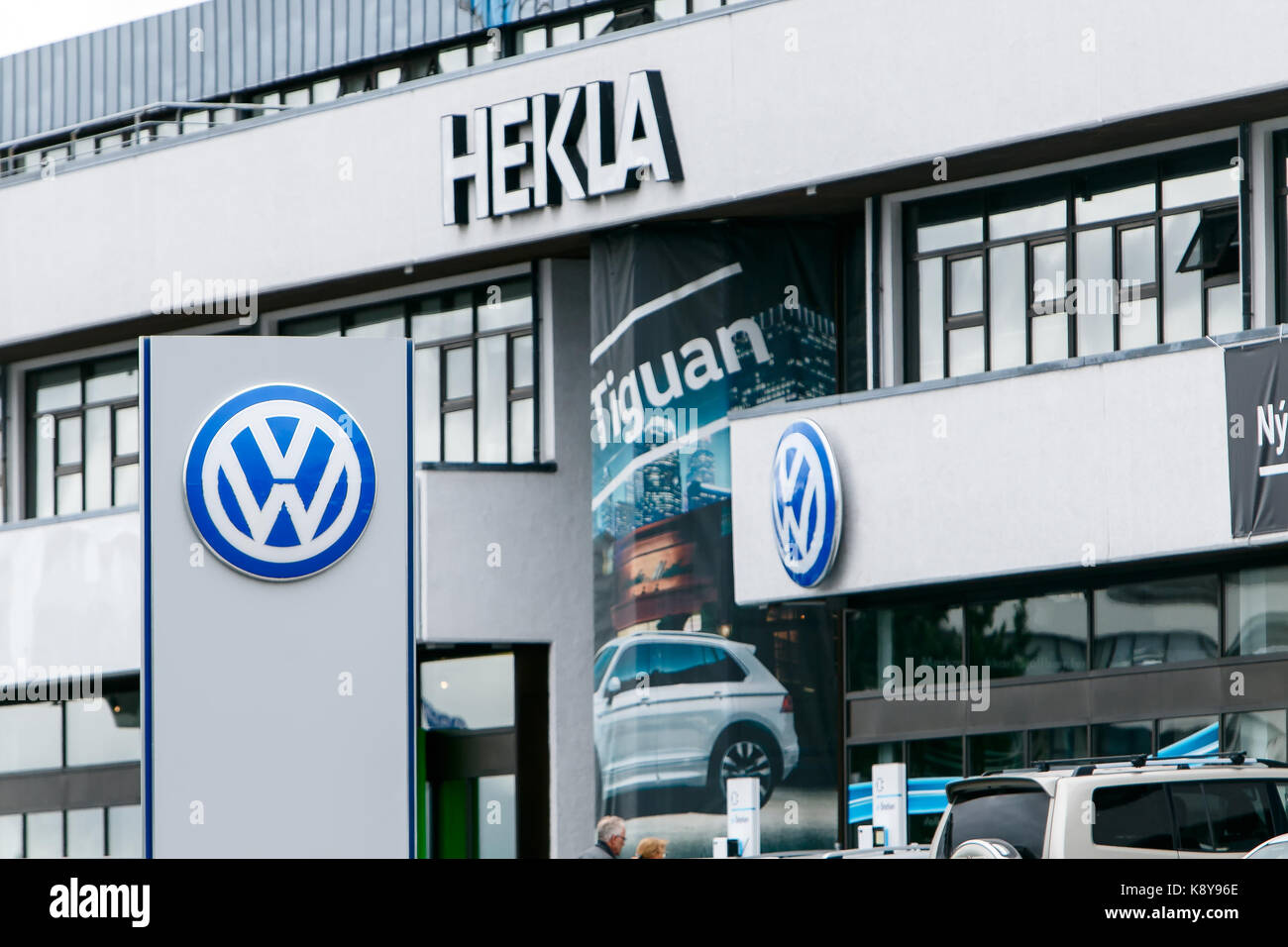 Volkswagen logo is put up on display at their dealership in Reykjavik. Stock Photo