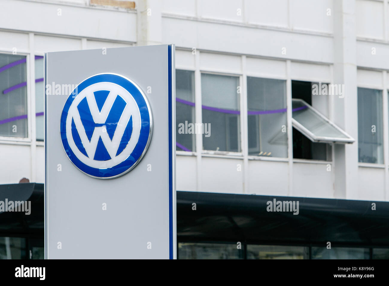 Volkswagen logo is put up on display at their dealership in Reykjavik. Stock Photo