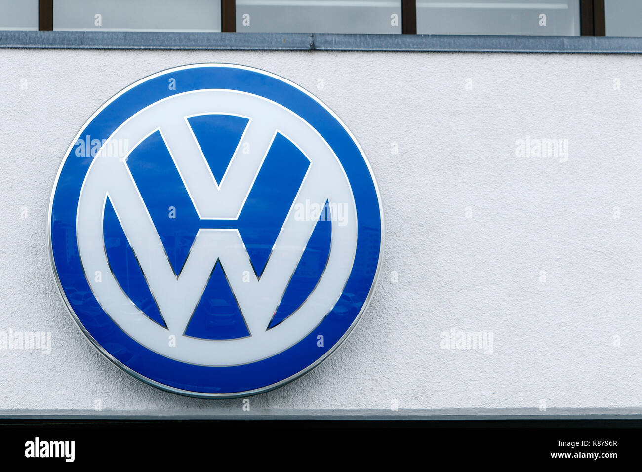 Volkswagen logo is put up on display at their dealership in Reykjavik. Stock Photo