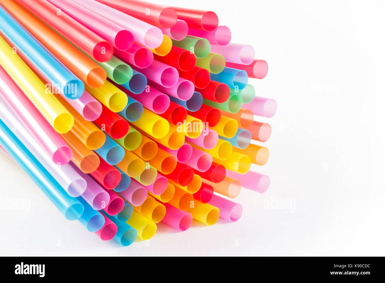 Colorful drinking straws on white background Stock Photo - Alamy