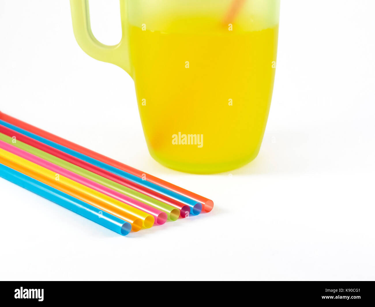 Colorful drinking straws on white background Stock Photo - Alamy