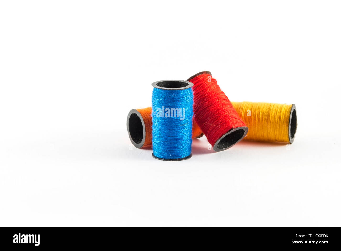 Sewing Threads on white background Stock Photo Alamy