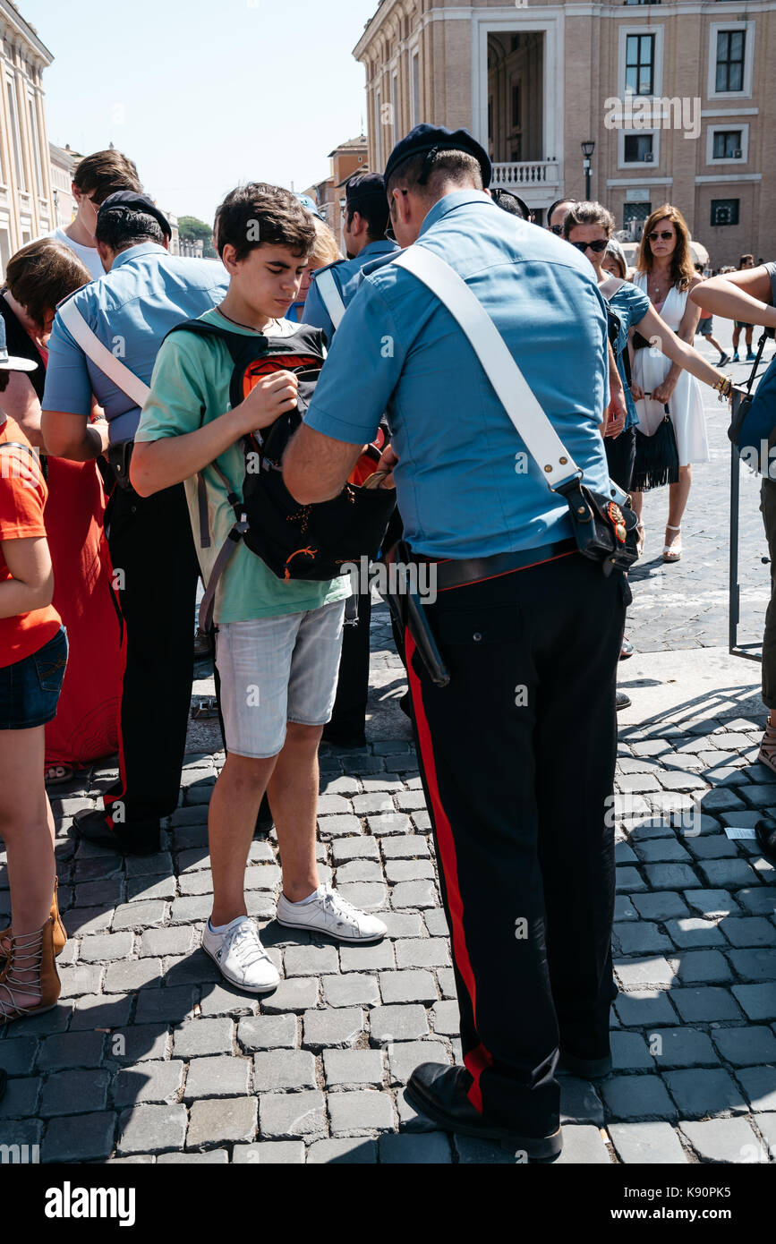 Policeman inspecting bags of pilgrims in Vatican Stock Photo Alamy