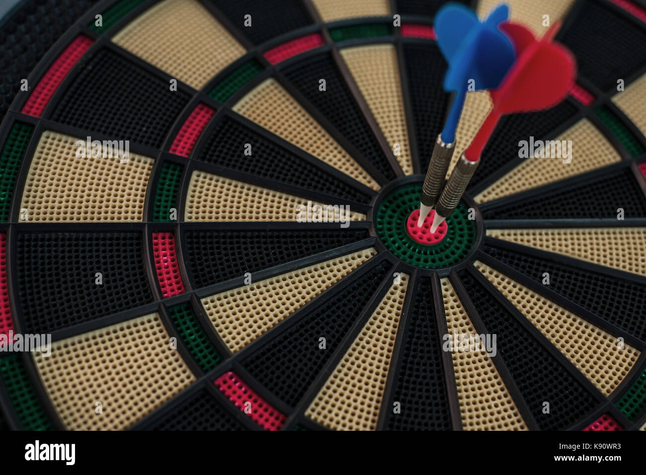 Two darts on a dartboard's center Stock Photo Alamy
