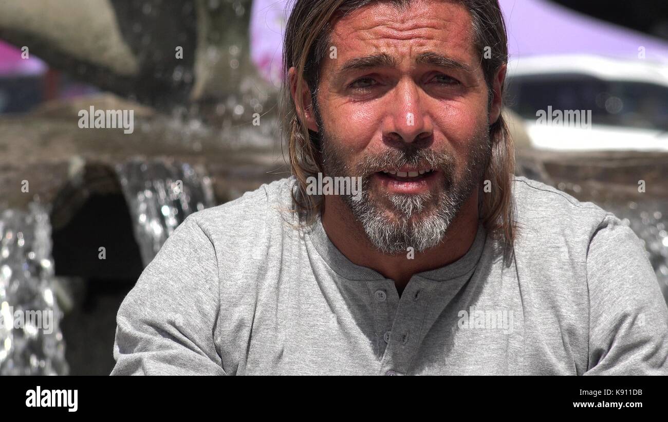 Unhappy Handsome Spanish Person Stock Photo - Alamy
