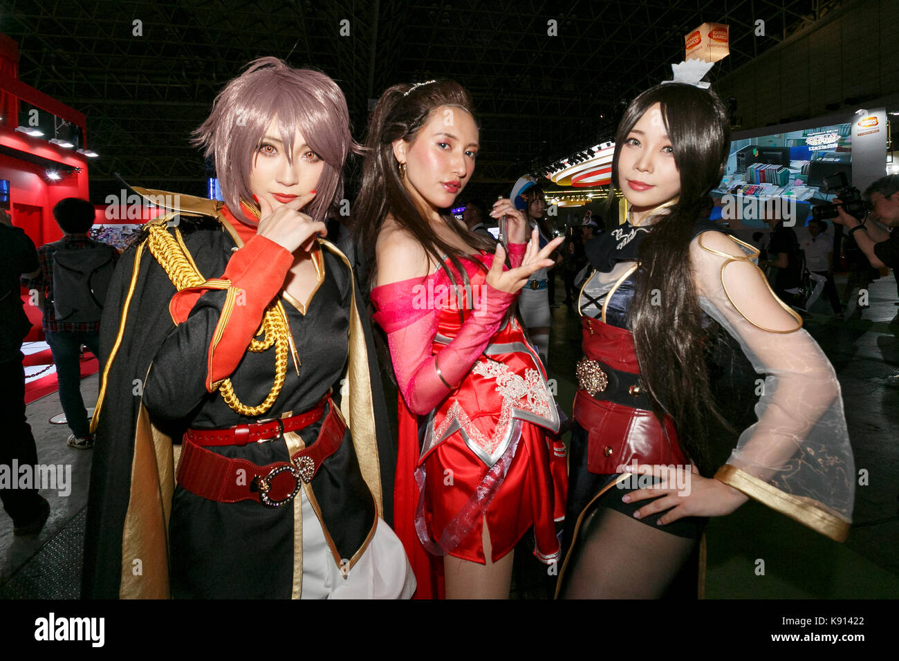 Chiba, Japan. 21st Sep, 2017. Cosplayers pose for a photograph during the Tokyo Game Show (TGS 2017) on September 21, 2017, Chiba, Japan. This year's event hosts 609 companies from 36 different countries, introducing 1,317 video game titles for smartphones, games consoles, VR, AR and MR platforms. The show, which expects to attract 250,000 visitors, runs until September 24 at the International Convention Complex Makuhari Messe in Chiba; and will be streamed live around the world. Credit: Rodrigo Reyes Marin/AFLO/Alamy Live News Stock Photo