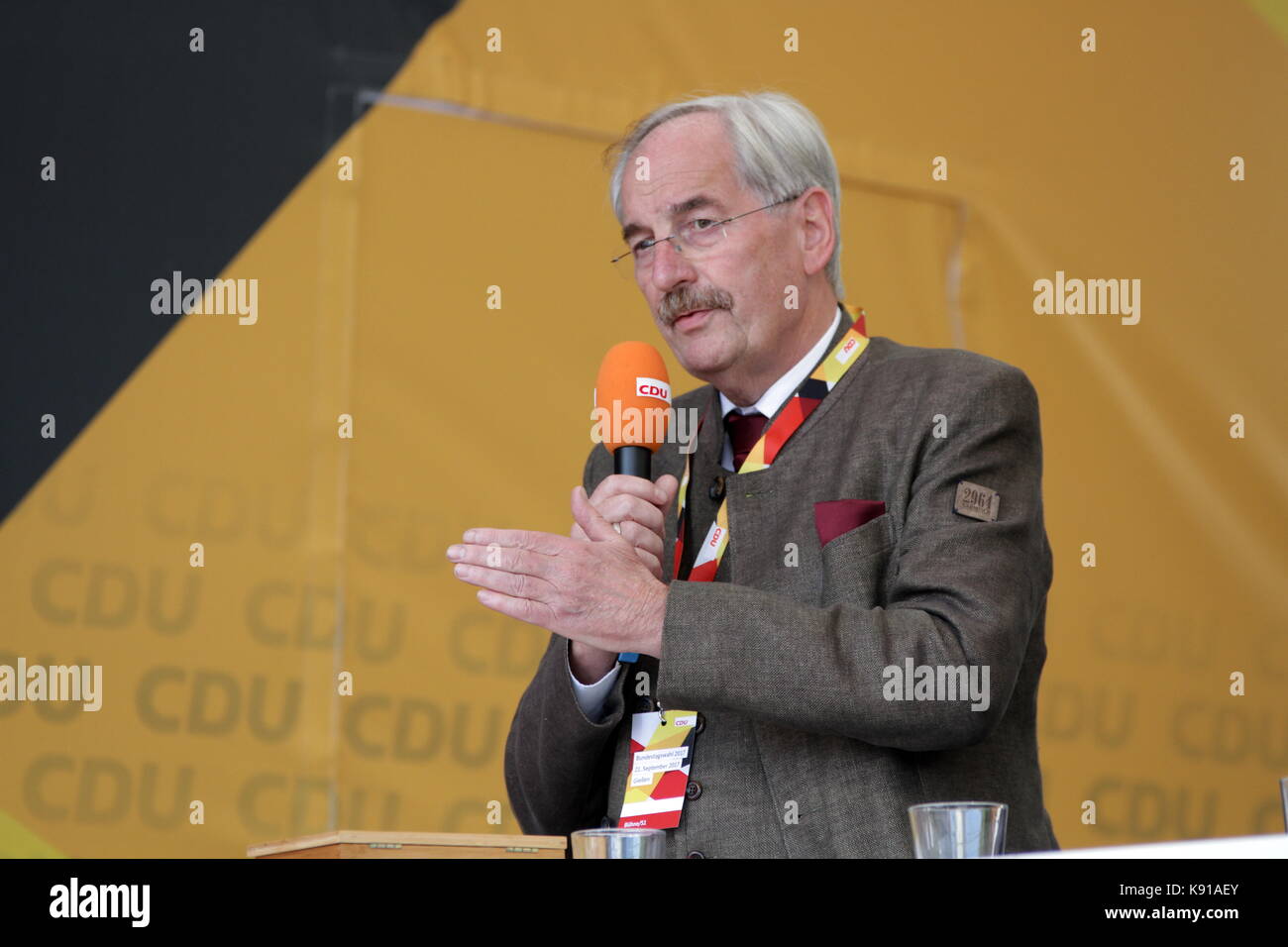 Giessen, Germany. 21st September, 2017. Hans-Jürgen Irmer, CDU direct candidate of constituency 172/Lahn-Dill 2 to the federal Bundestag elections in Germany (24th Sept 2017), is guest speaker at election campaign speech of Angela Merkel, Chancellor of Germany, leader of the Christian Democratic Union and leading candidate as federal chancellor  to the federal Bundestag elections, here at Brandplatz in Giessen, Germany. Credit: Christian Lademann Stock Photo