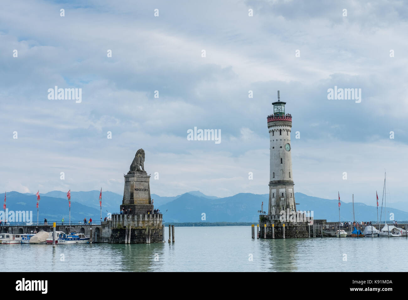 Harbour entrance with lighthouse and Bavarian Lion sculpture ,Island of Lindau, Lake Constanz, Bavaria Stock Photo