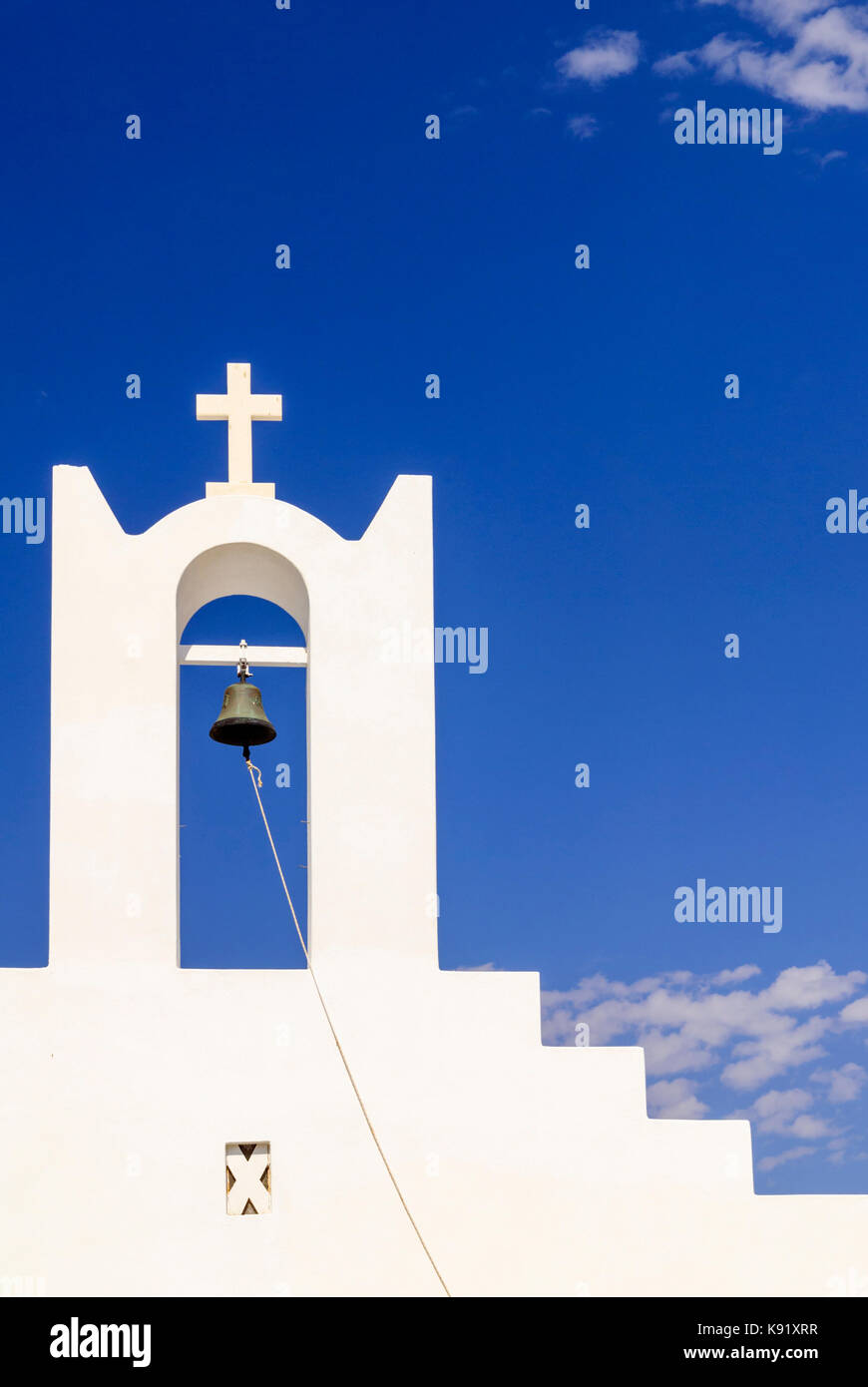 Whitewashed Greek church and blue sky on the island of Paros, Cyclades, Greece Stock Photo