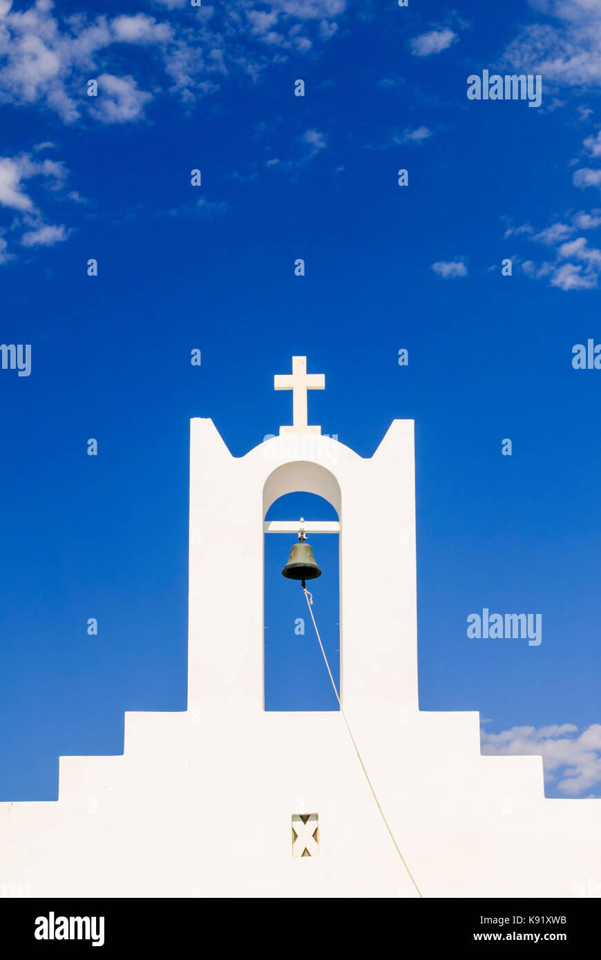 Whitewashed Greek church and blue sky on the island of Paros, Cyclades, Greece Stock Photo