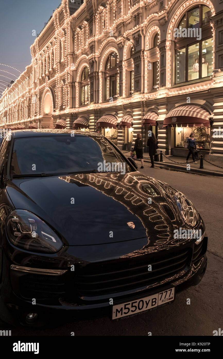Porsche car parked outside upmarket GUM shopping department store, a landmark attraction, Moscow, Russia. Stock Photo